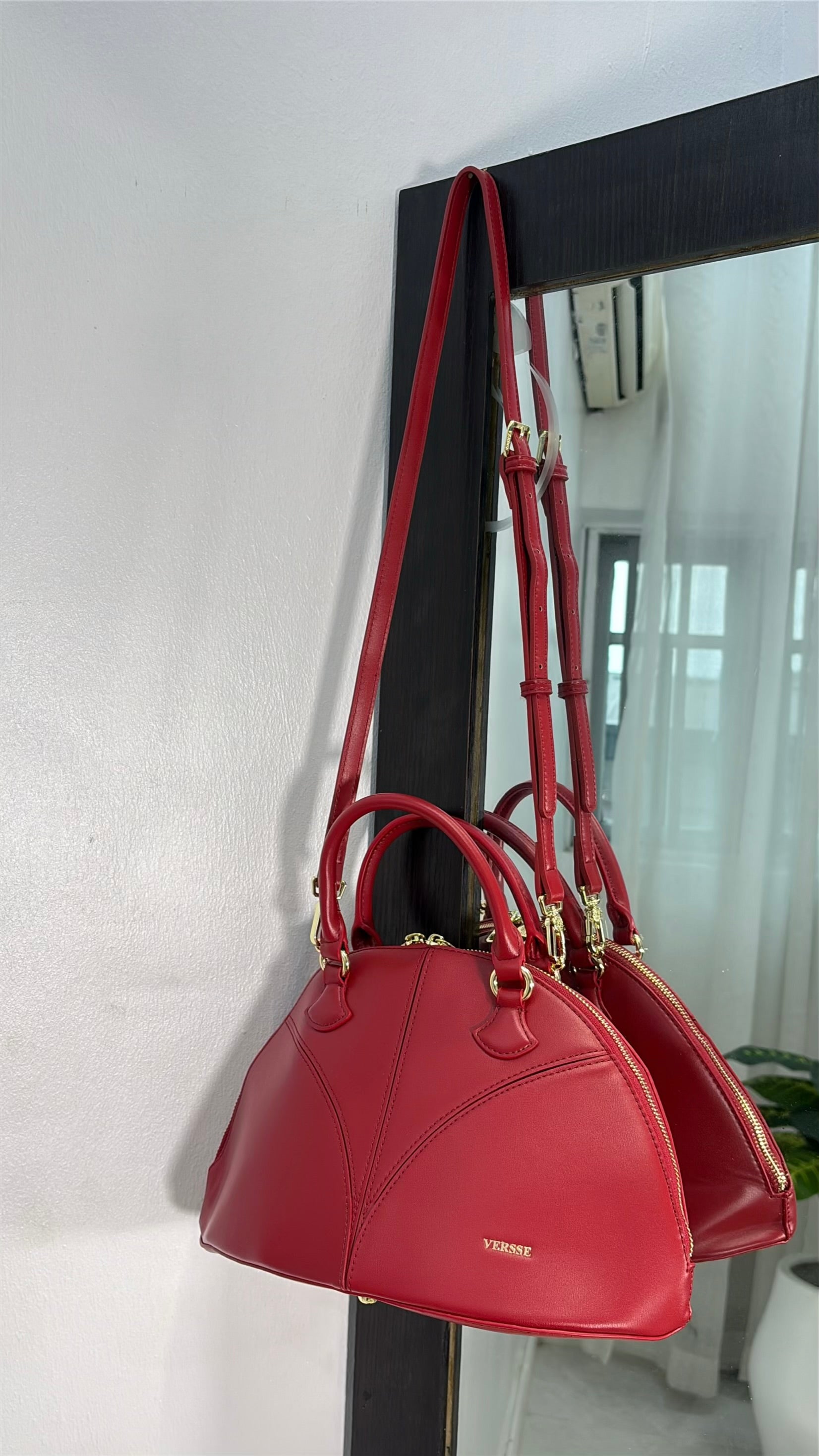 Versse Half-Moon handbag in Wine