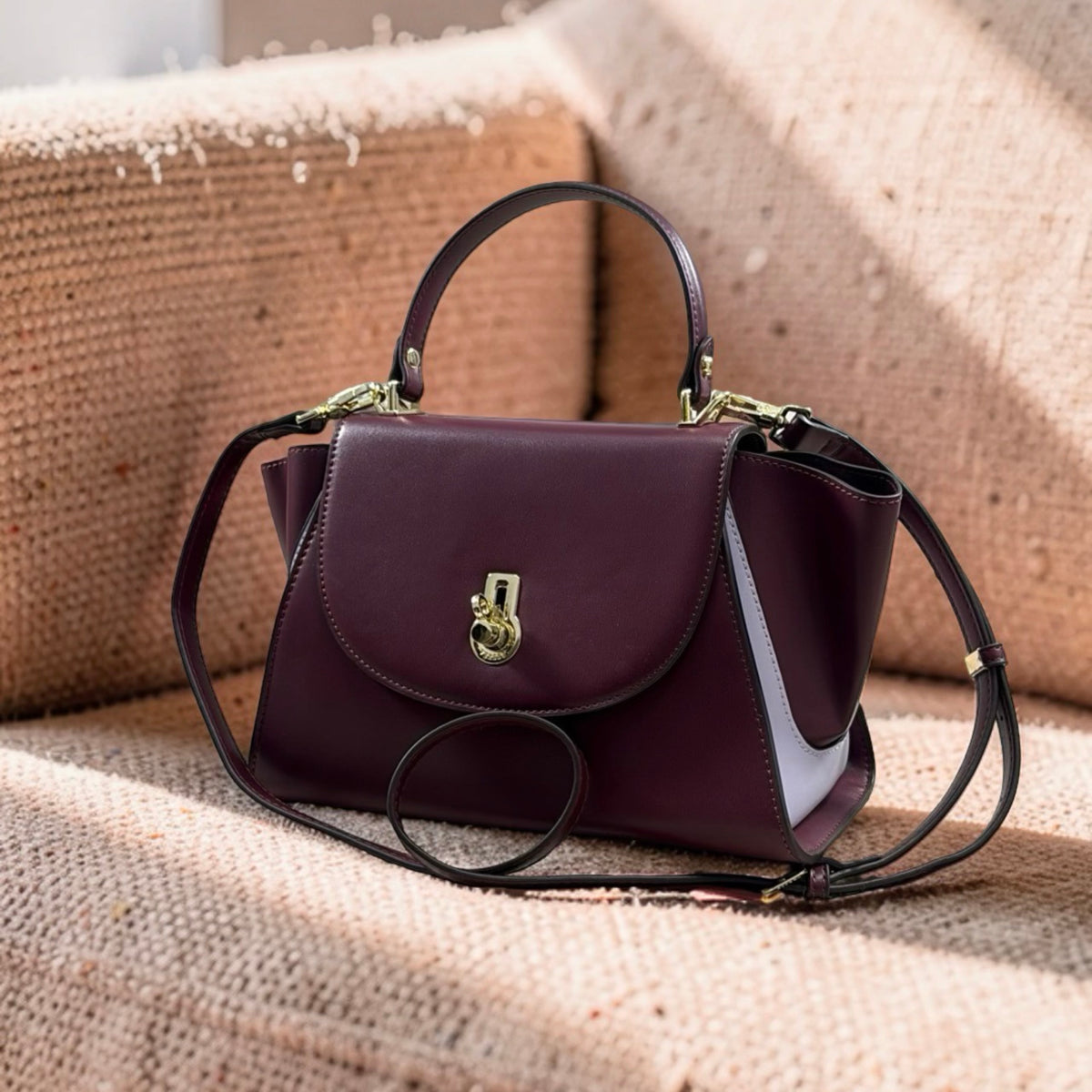 Versse Top Handle Winged Bag in Plum