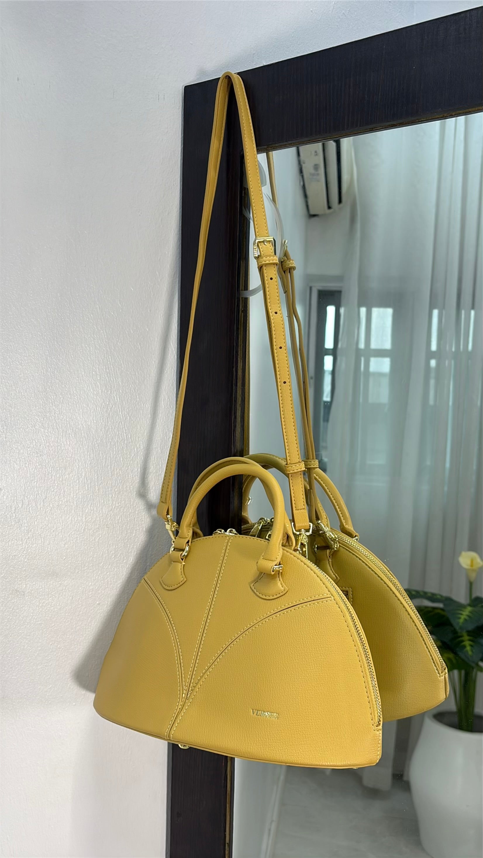 Versse Half-Moon handbag in Yellow