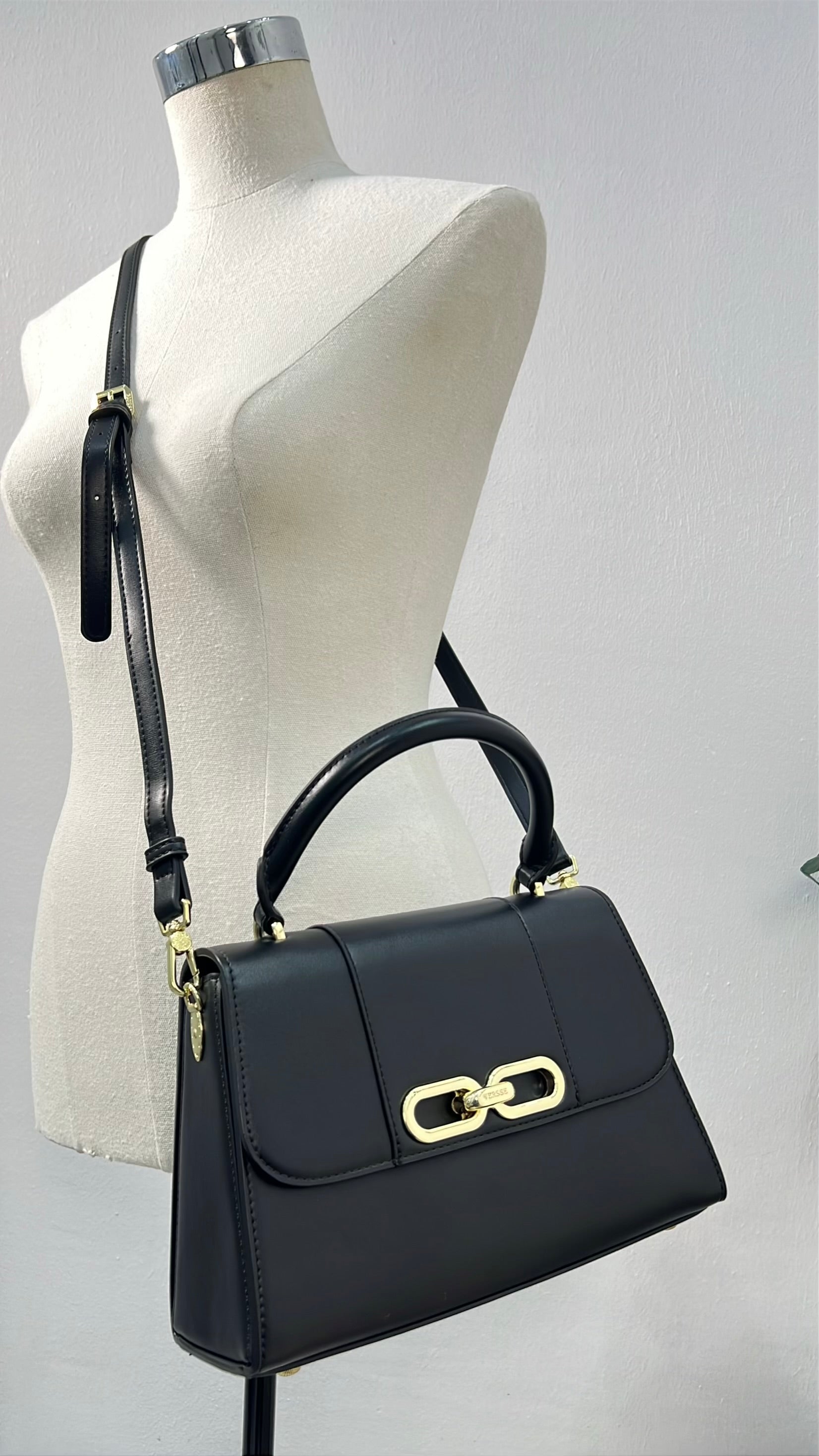 Versse Top handle Structured Flap Bag in Black