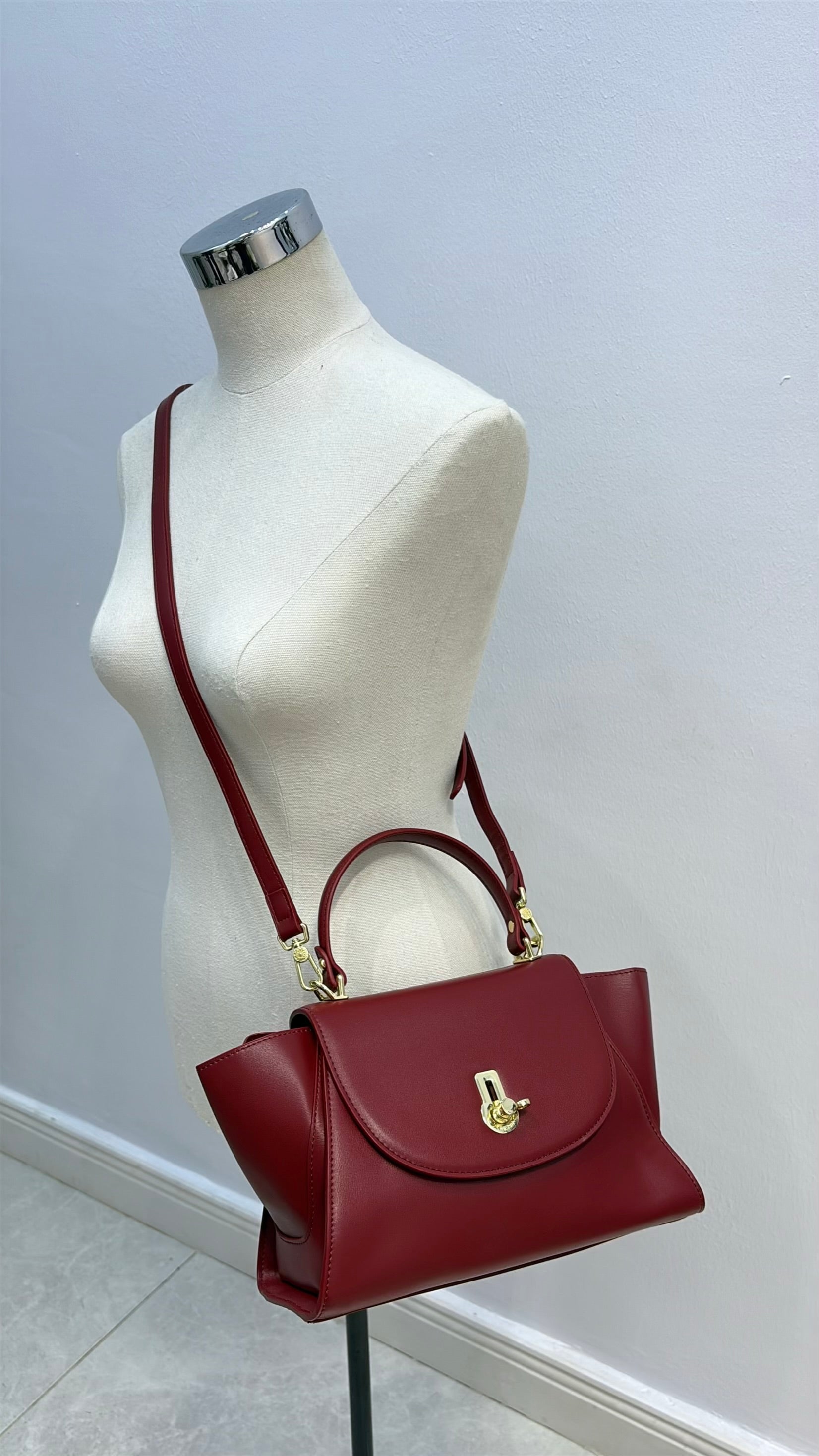 Versse Top Handle Winged Bag in Wine