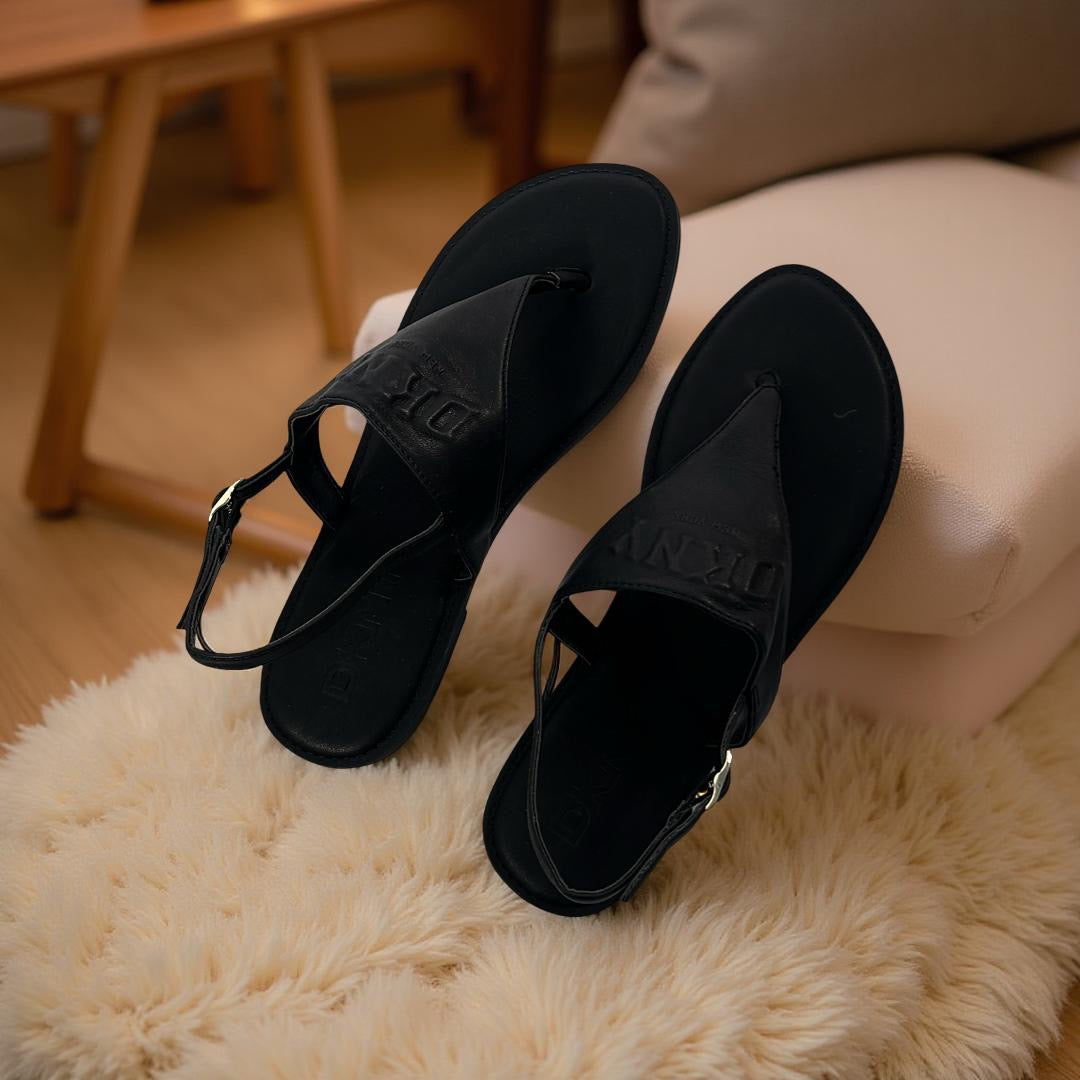 DKNY Logo-Engraved Leather Flat sandal in Black