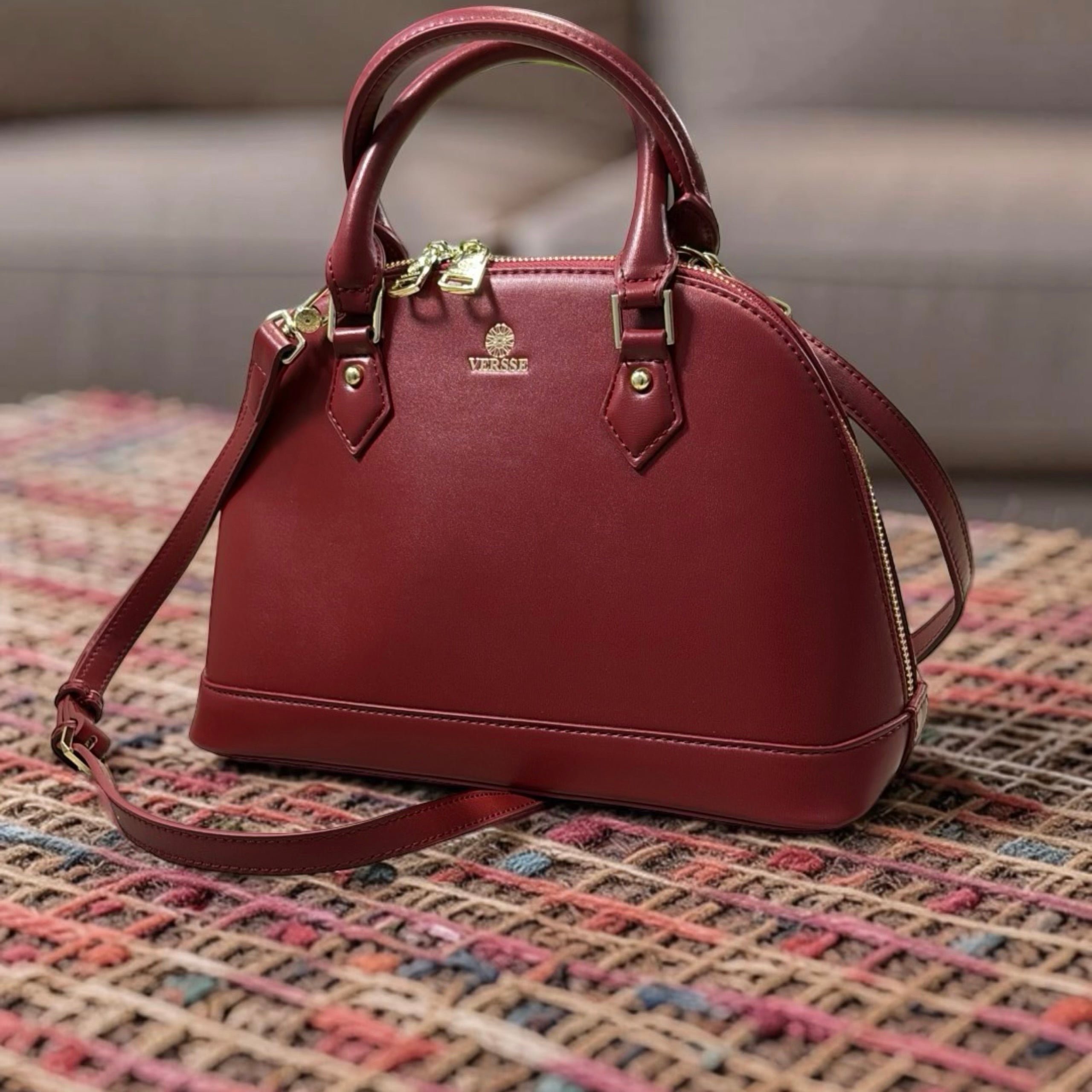 Versse Oval Top Handbag in Maroon