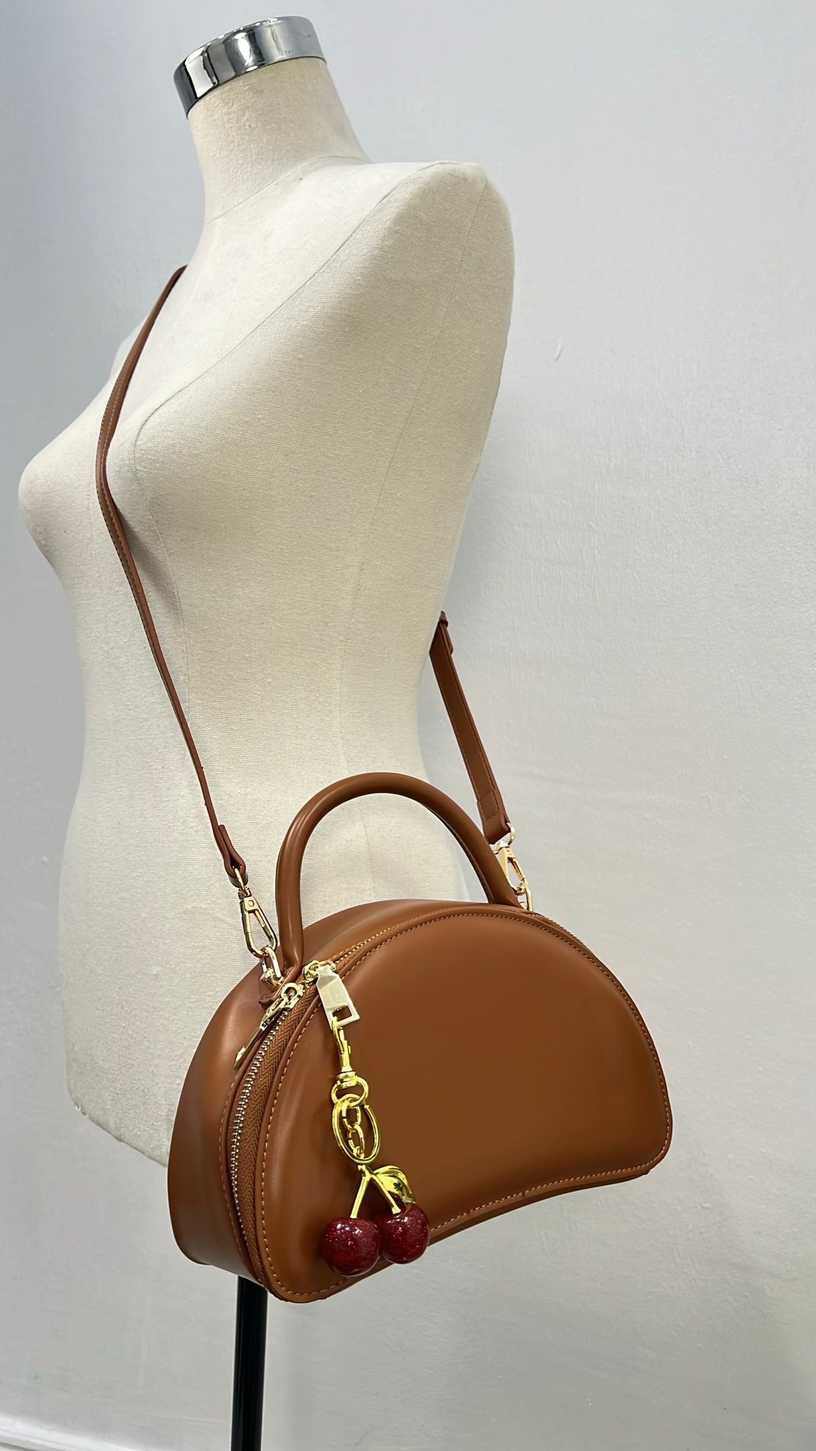 Classic Top Handle Semi-Circle Cherry Charm Mini Bag in Tan