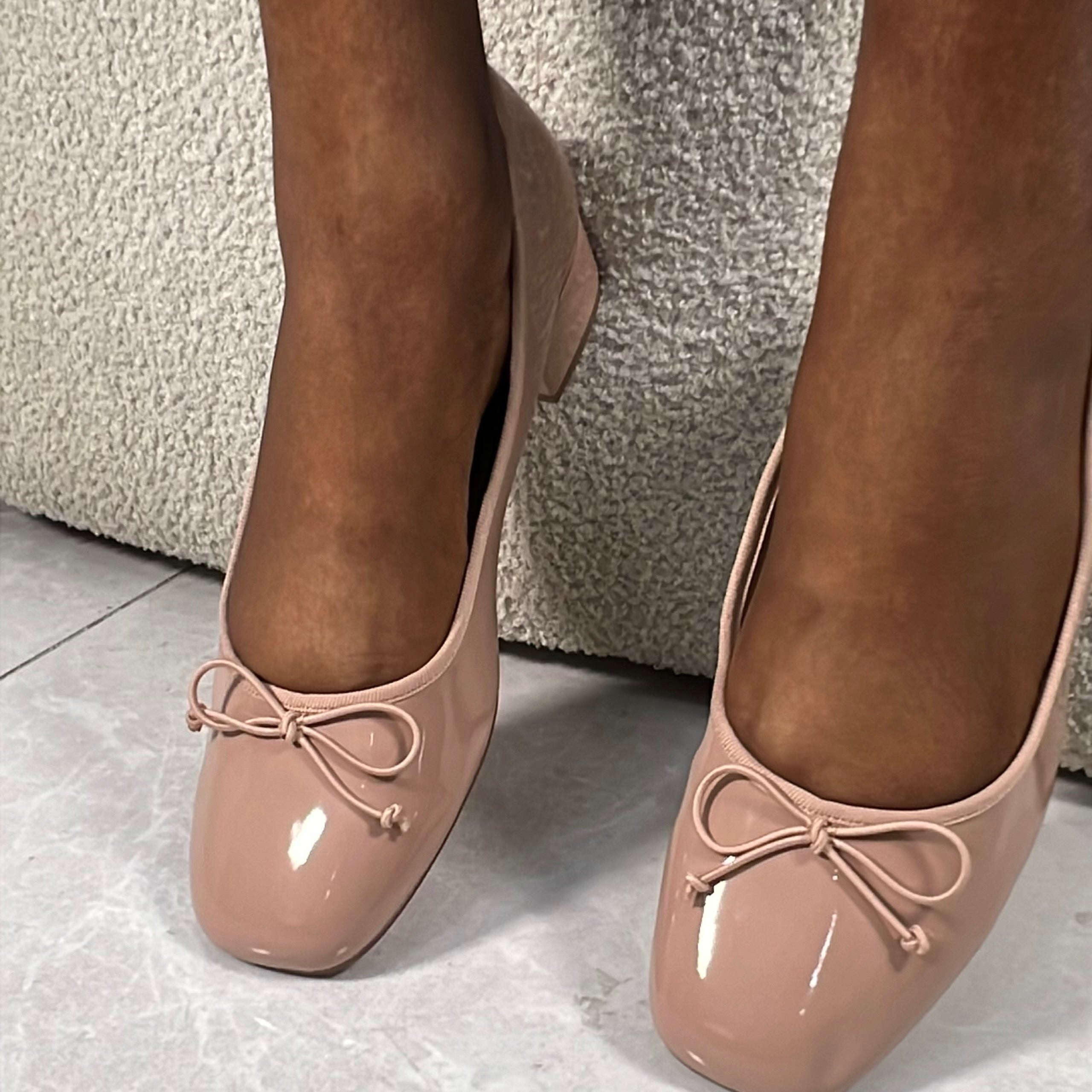 Bold Bow Detail Patent Leather Block Heel Pump in Nude