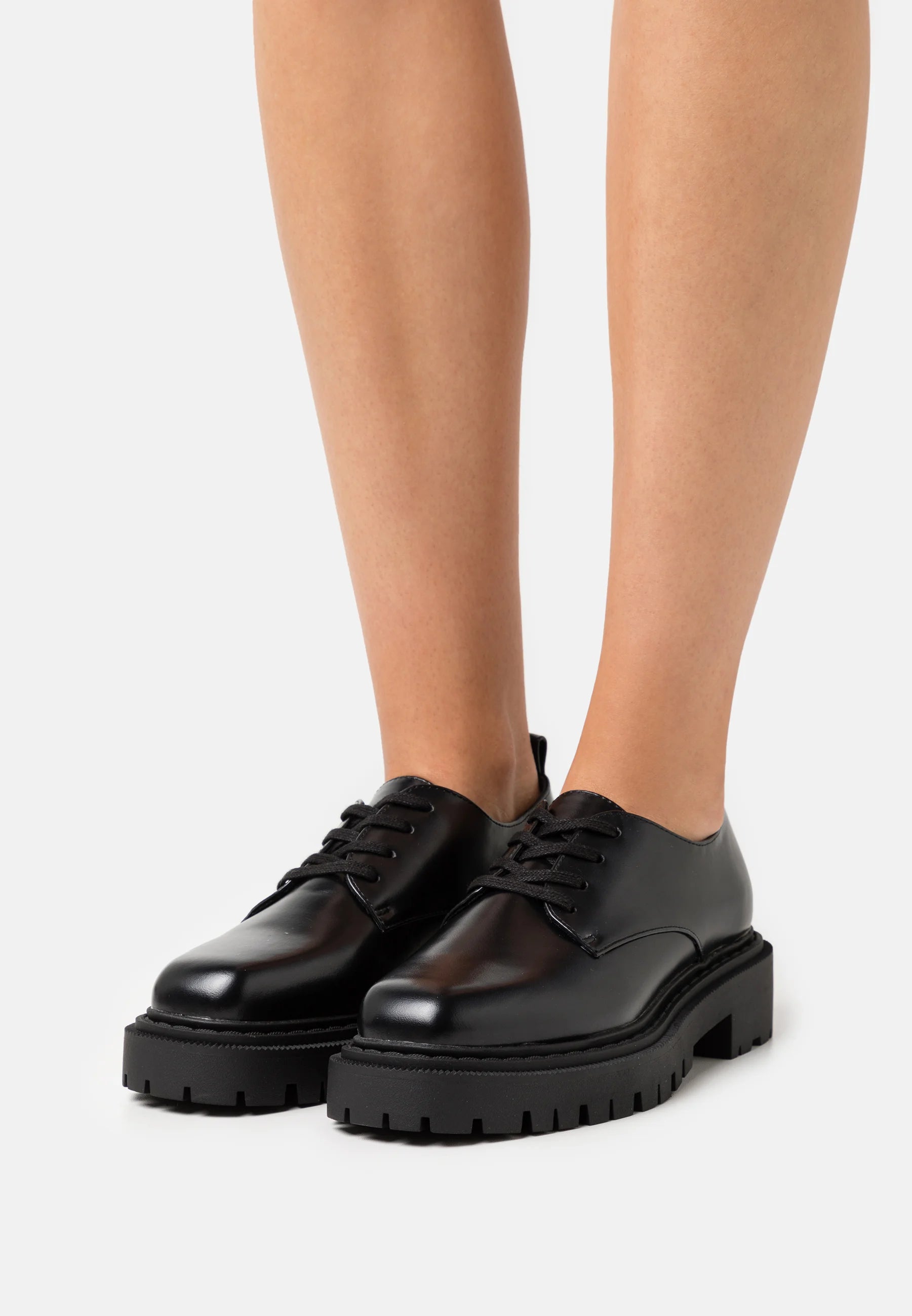 MONKI PULL-TAB LACE-UP SHOES IN BLACK