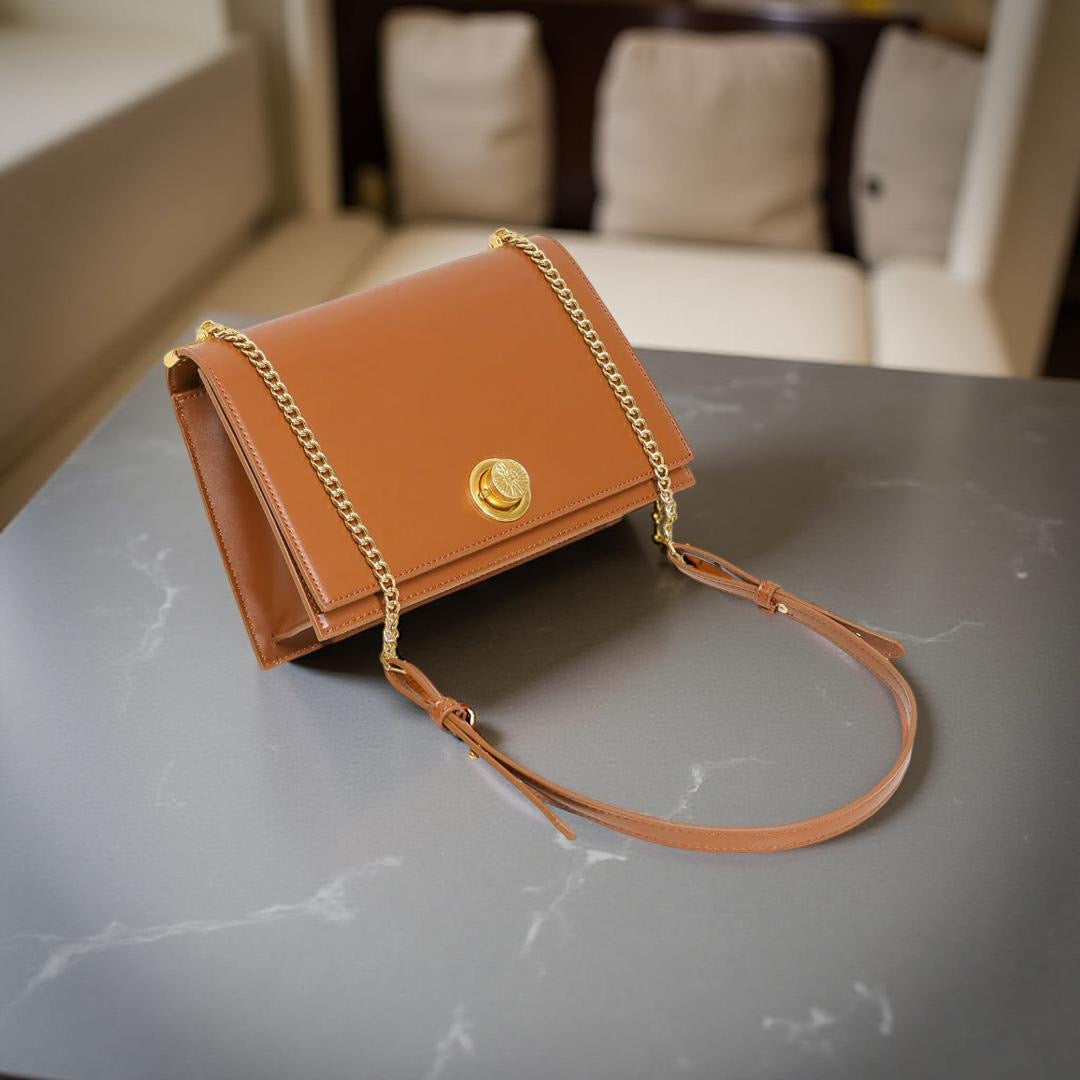 Versse Metallic Turn-Lock Chain Crossbody Bag in Brown