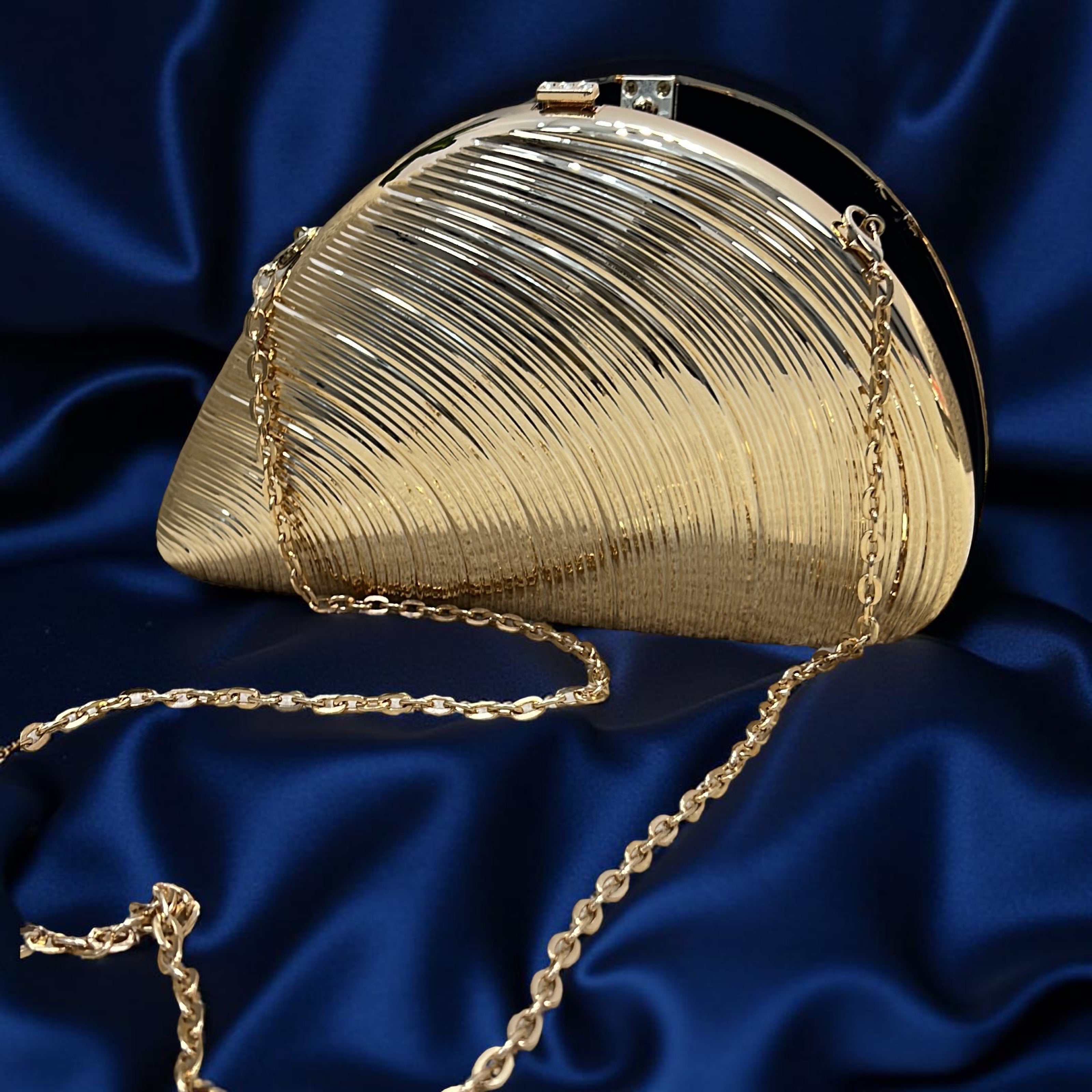 Metallic Shell-Shaped Clutch Purse in Gold