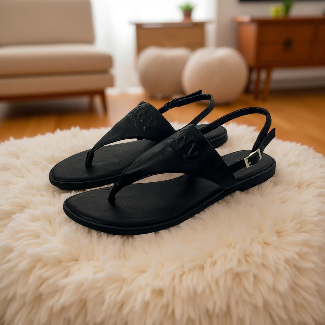 DKNY Logo-Engraved Leather Flat sandal in Black