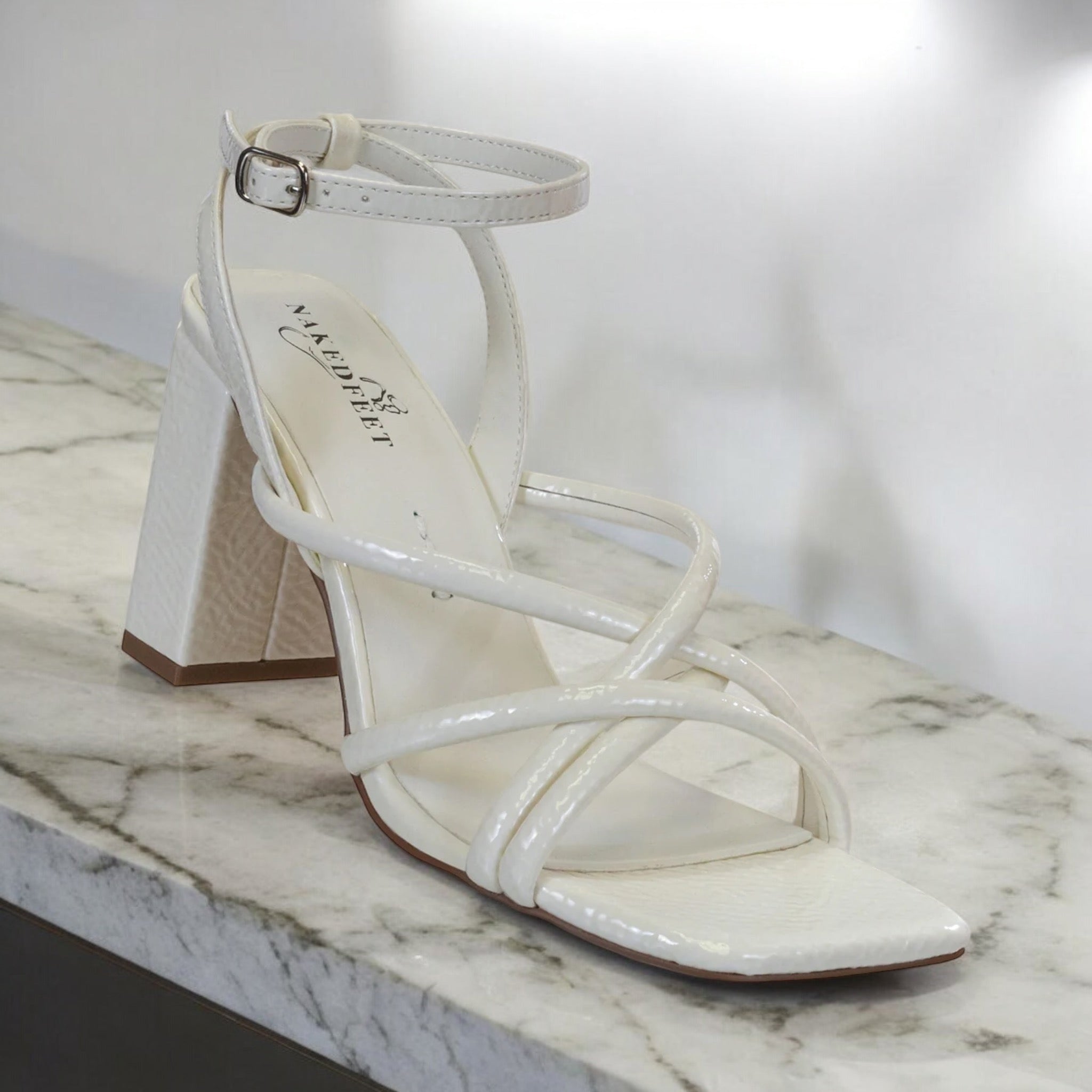 NAKEDFEET TUBE STRAPS BLOCK HEEL SANDAL IN CREAM