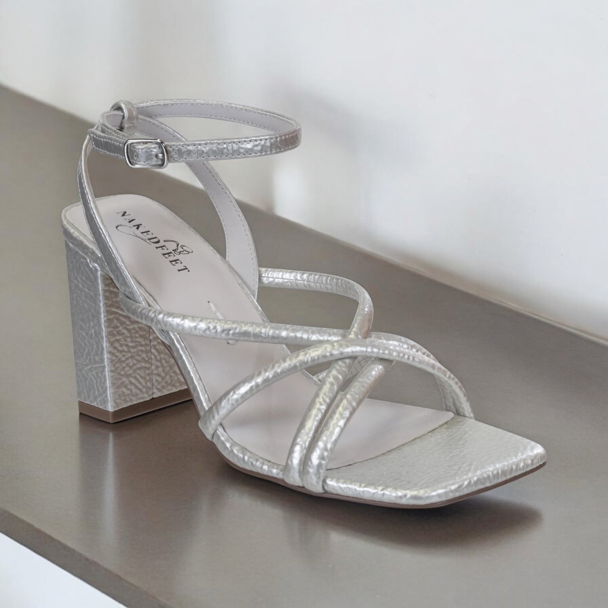 NAKEDFEET TUBE STRAPS BLOCK HEEL SANDAL IN SILVER