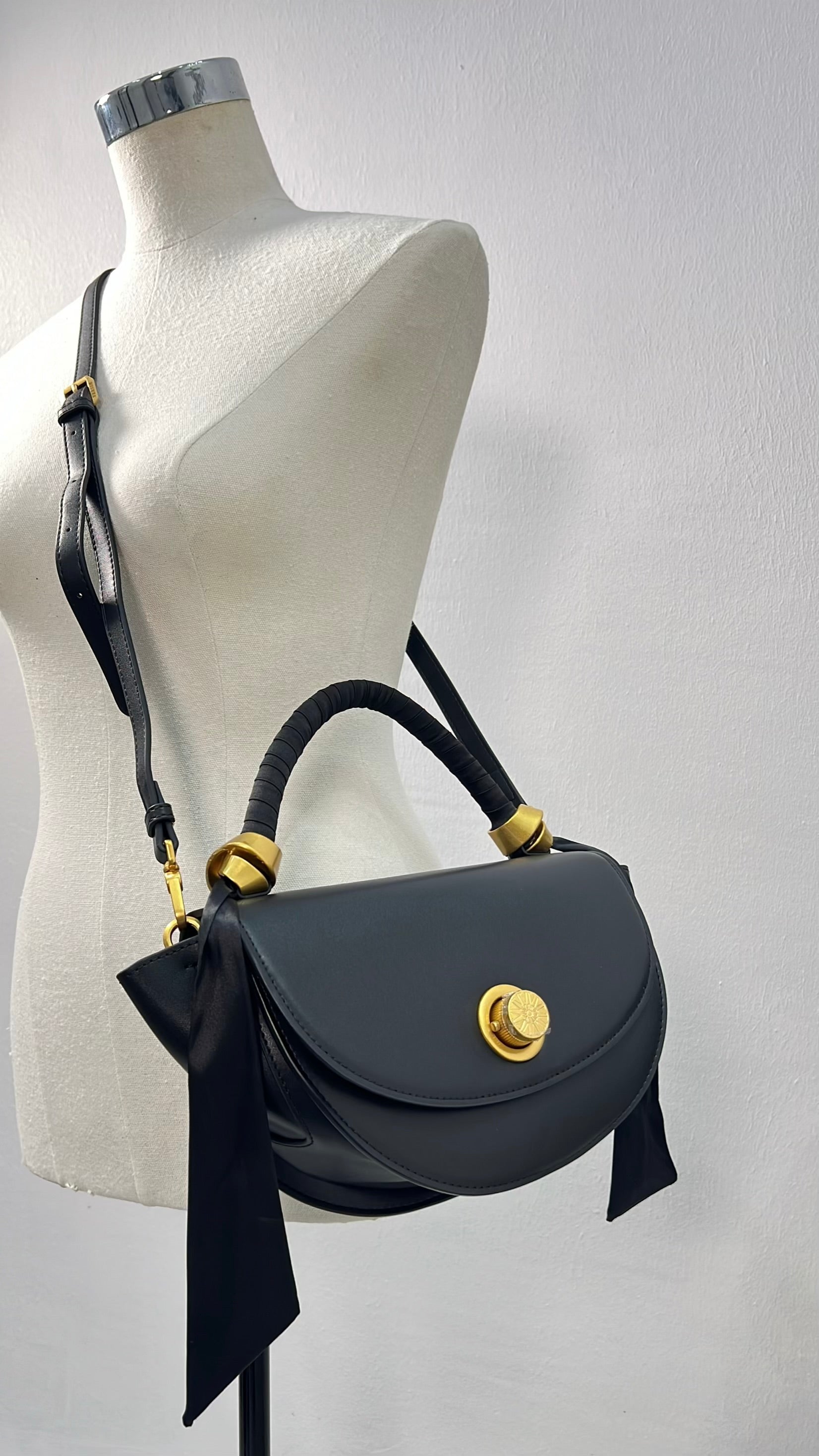 Versse Mini Top Handle Winged Bag in Black