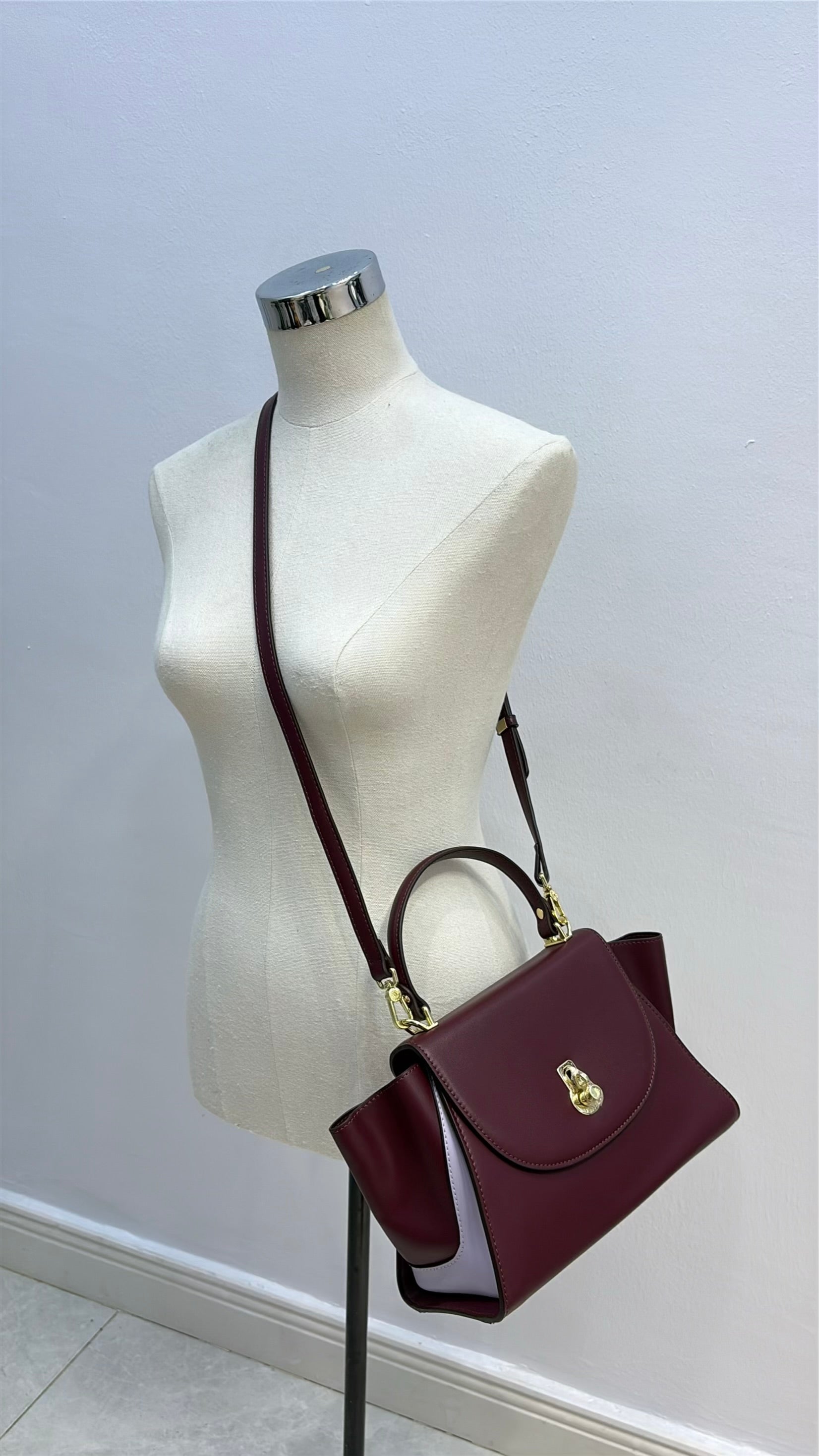Versse Top Handle Winged Bag in Plum