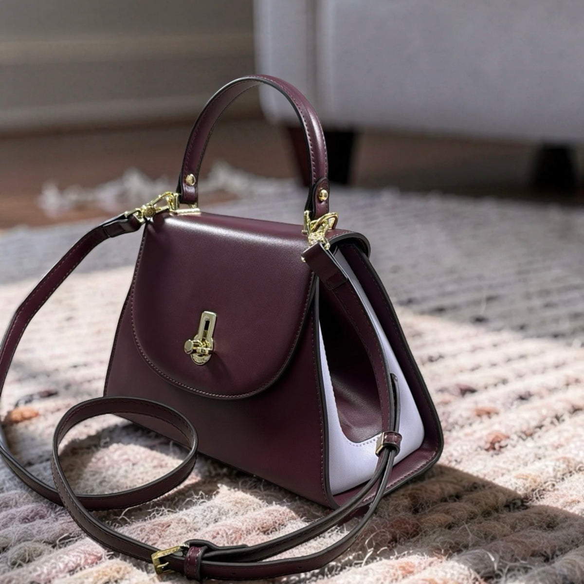 Versse Top Handle Winged Bag in Plum