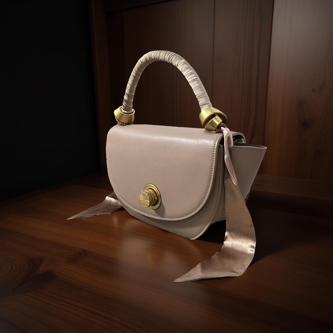 Versse Mini Top Handle Winged Bag in Beige