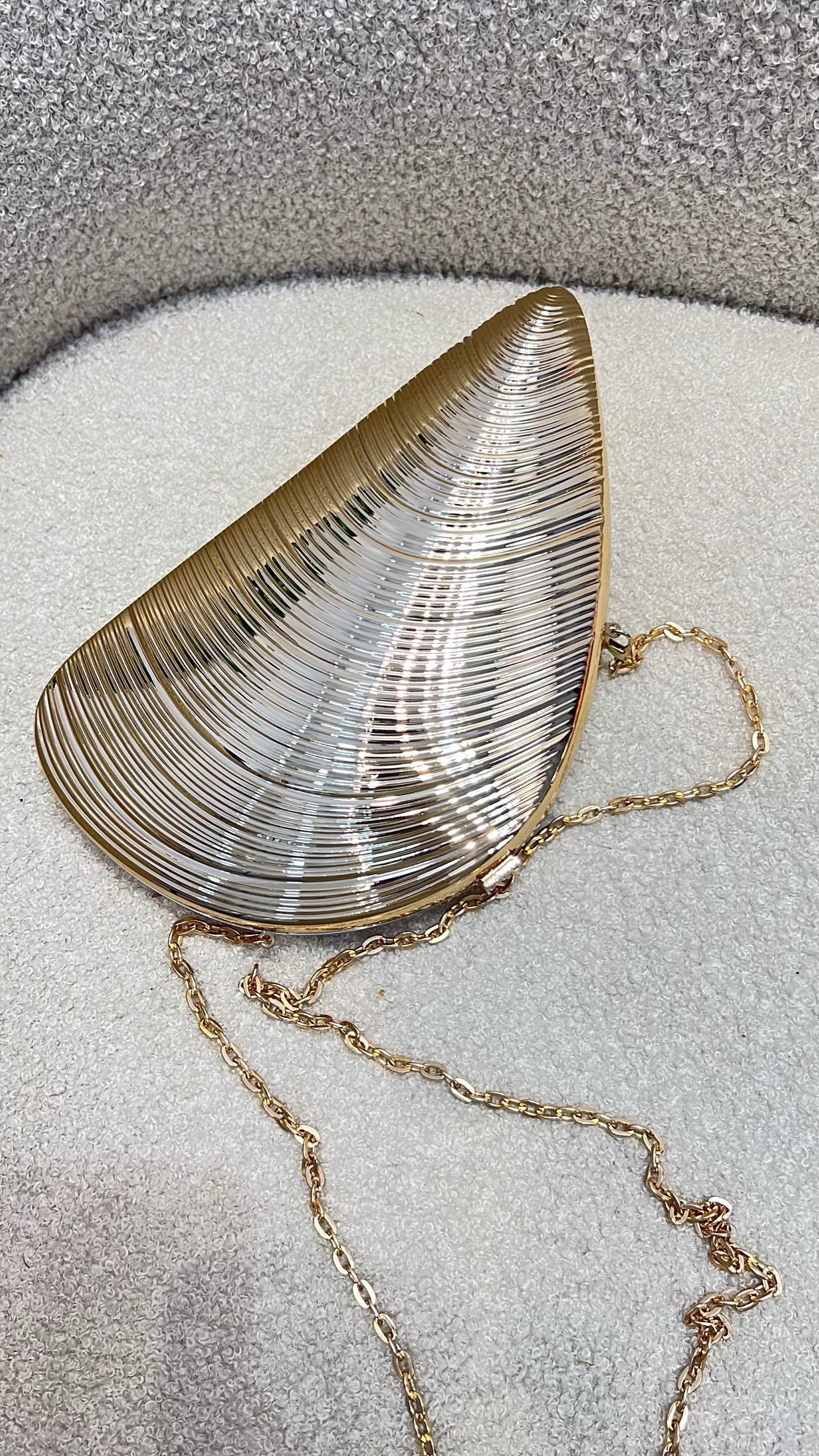 Metallic Shell-Shaped Clutch Purse in Gold