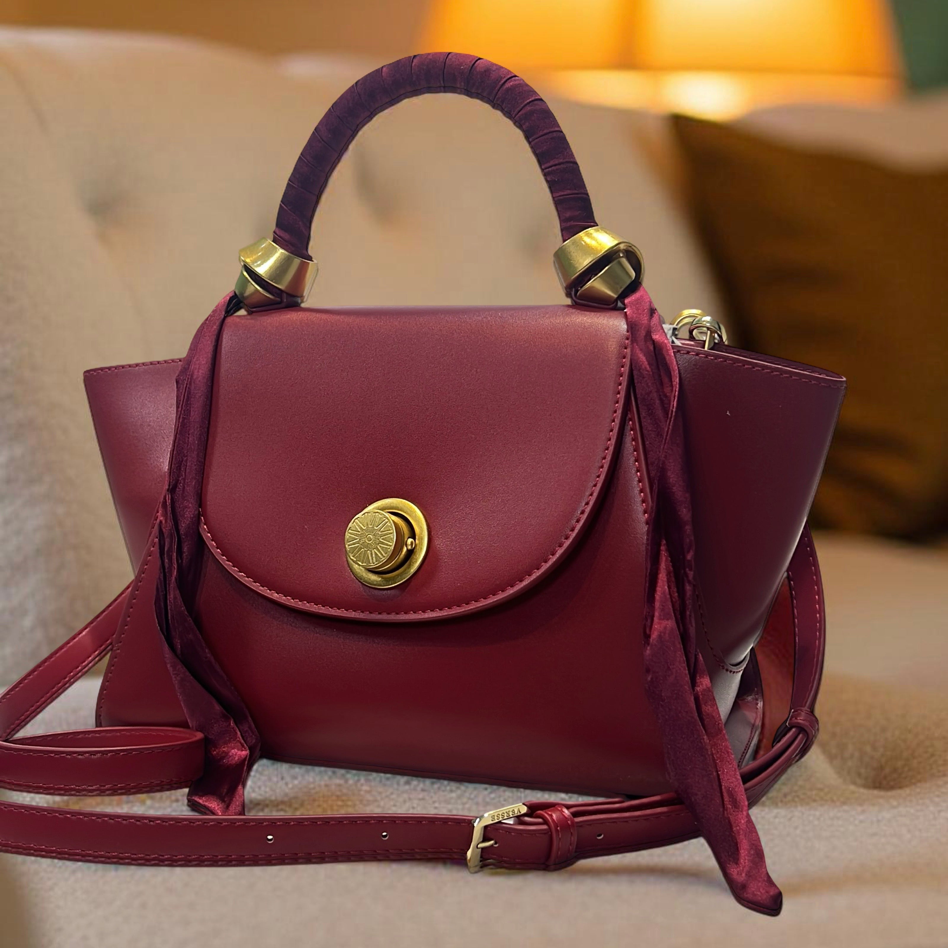 Versse Top Handle Winged Bag in Wine