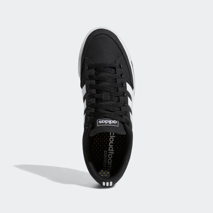 ADIDAS RETROVULC SNEAKERS WHITE STRIPE IN BLACK