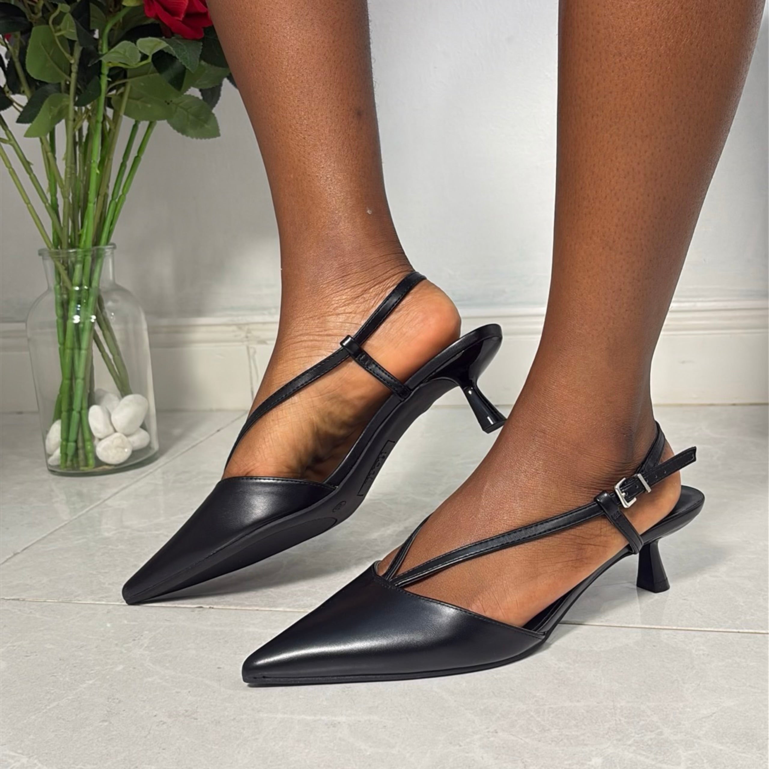 Fioni Leather Pointed Toe Heels in Black