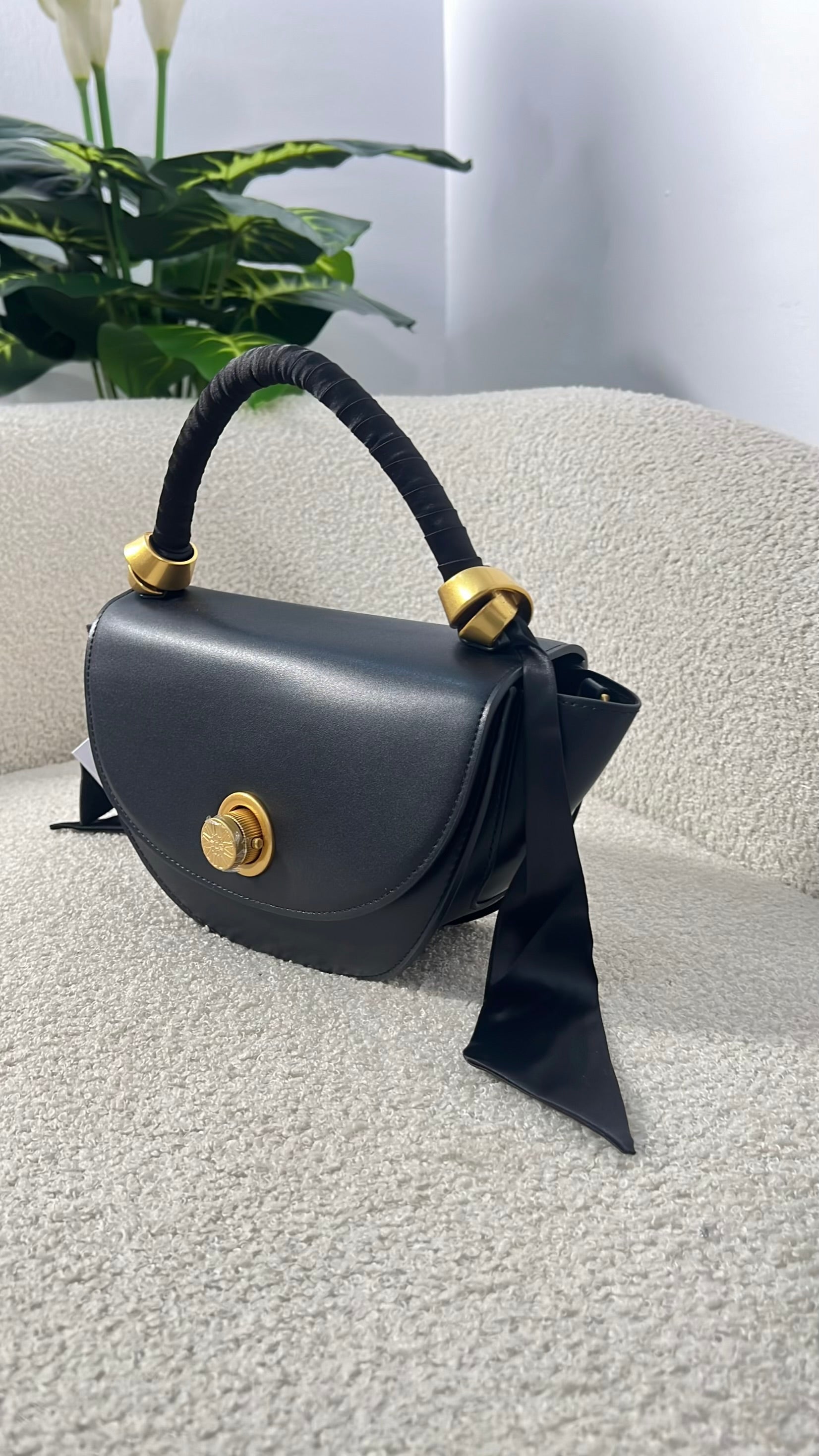 Versse Mini Top Handle Winged Bag in Black