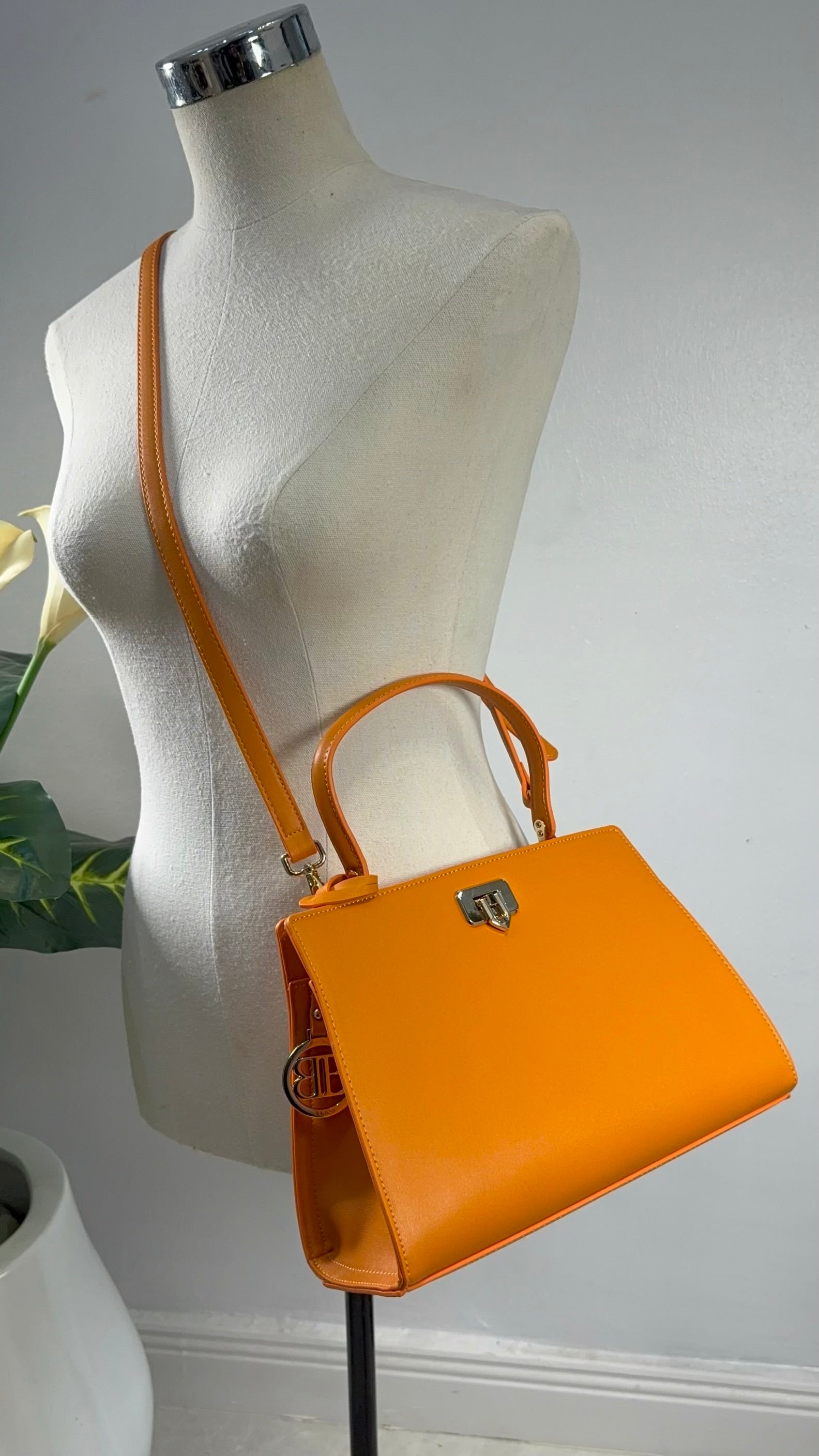 Bagco Single Top Handle Compact Bag in Orange