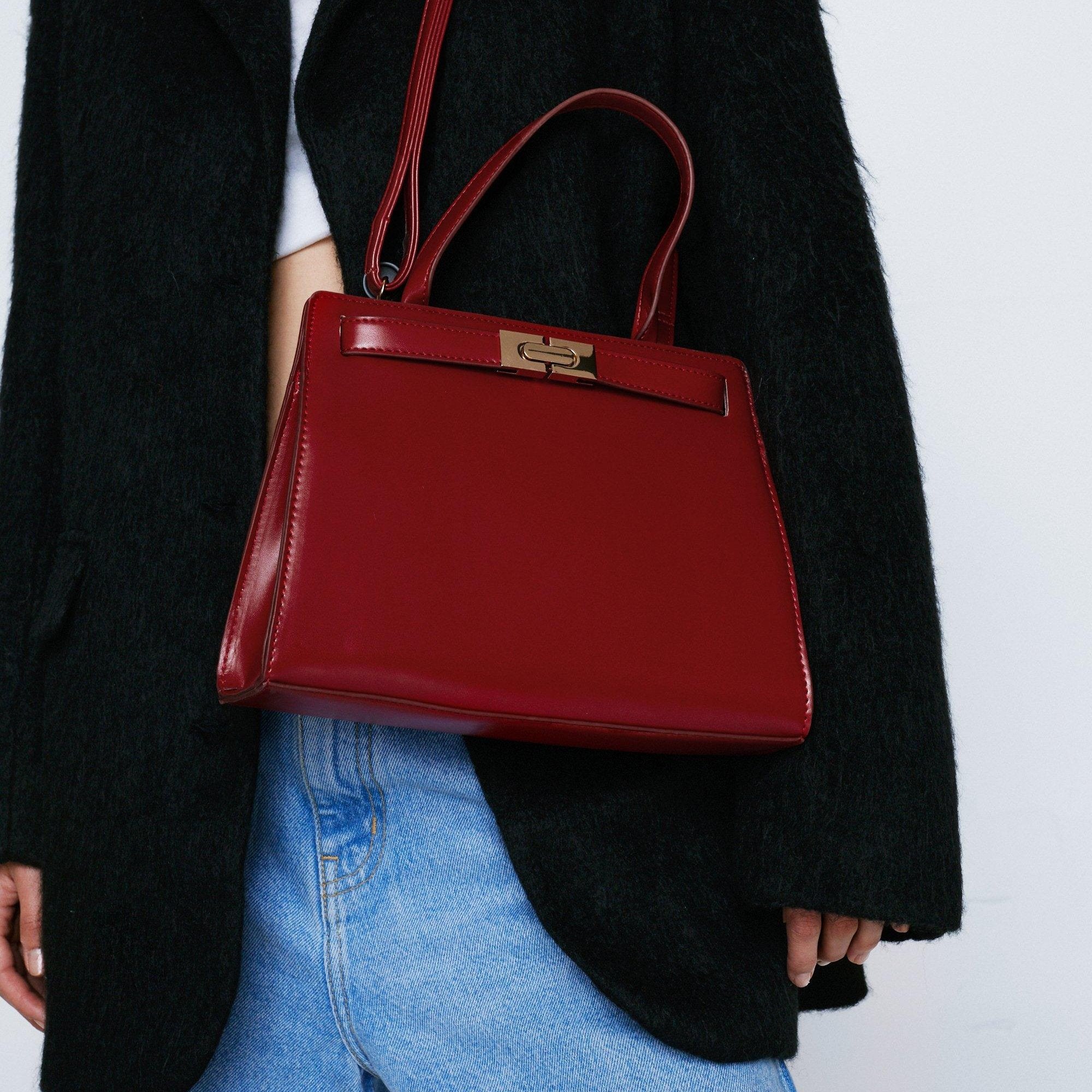 NASTY GAL FAUX LEATHER BUCKLE BAG IN RED