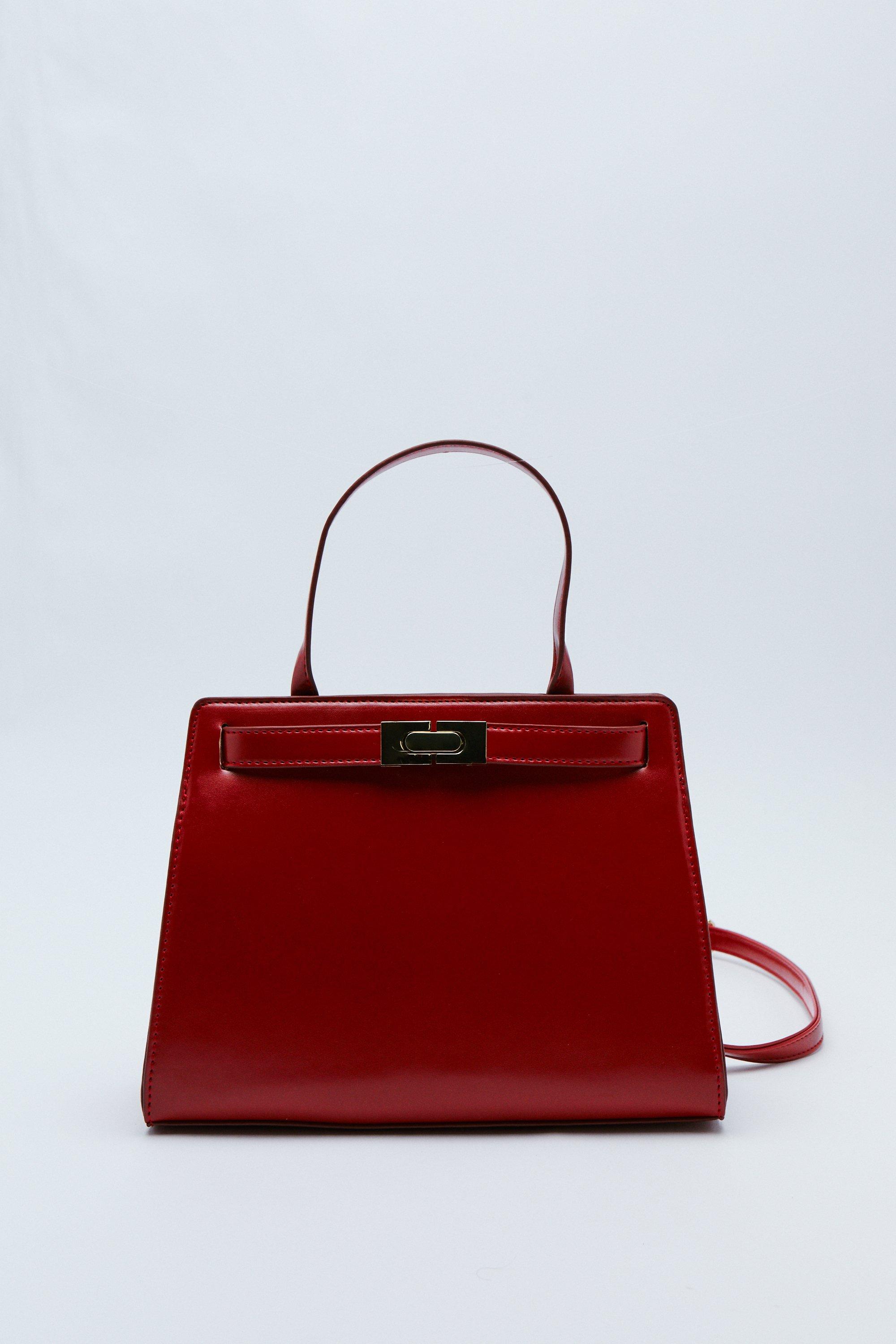 NASTY GAL FAUX LEATHER BUCKLE BAG IN RED