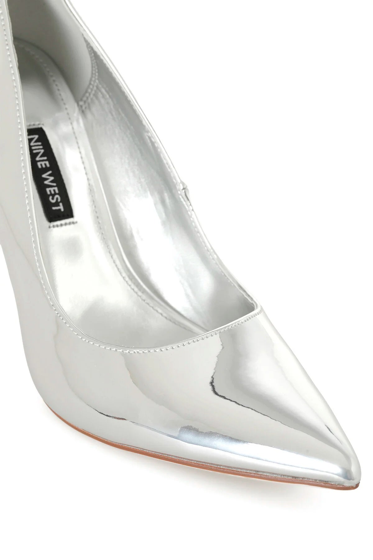 NINE WEST METALLIC POINTED TOE PUMP IN SILVER