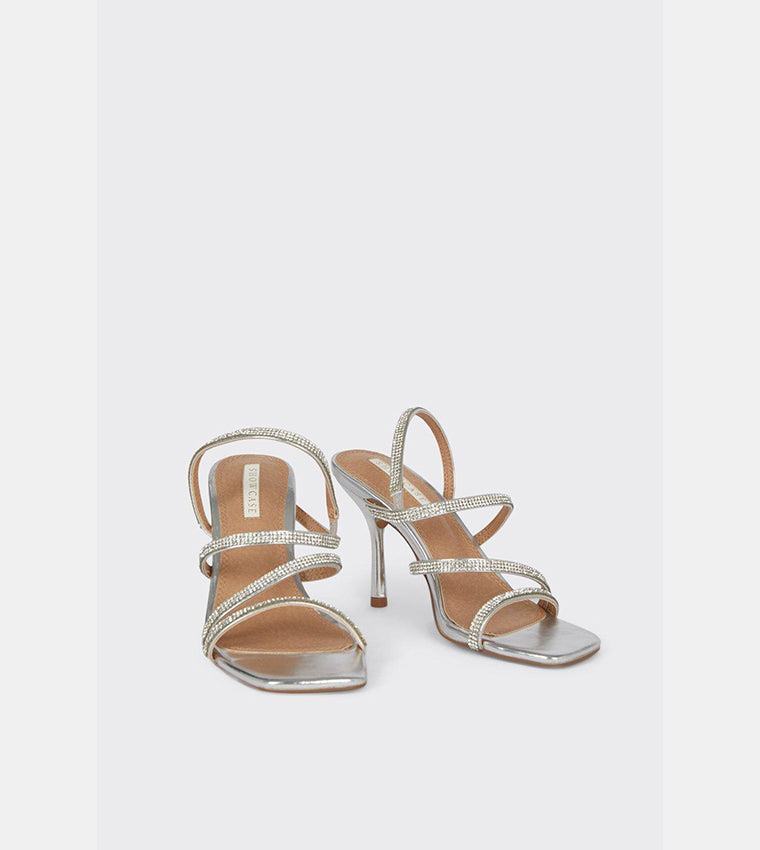 SHOWCASE EMBELLISHED STRAP HEELED SANDAL IN SILVER