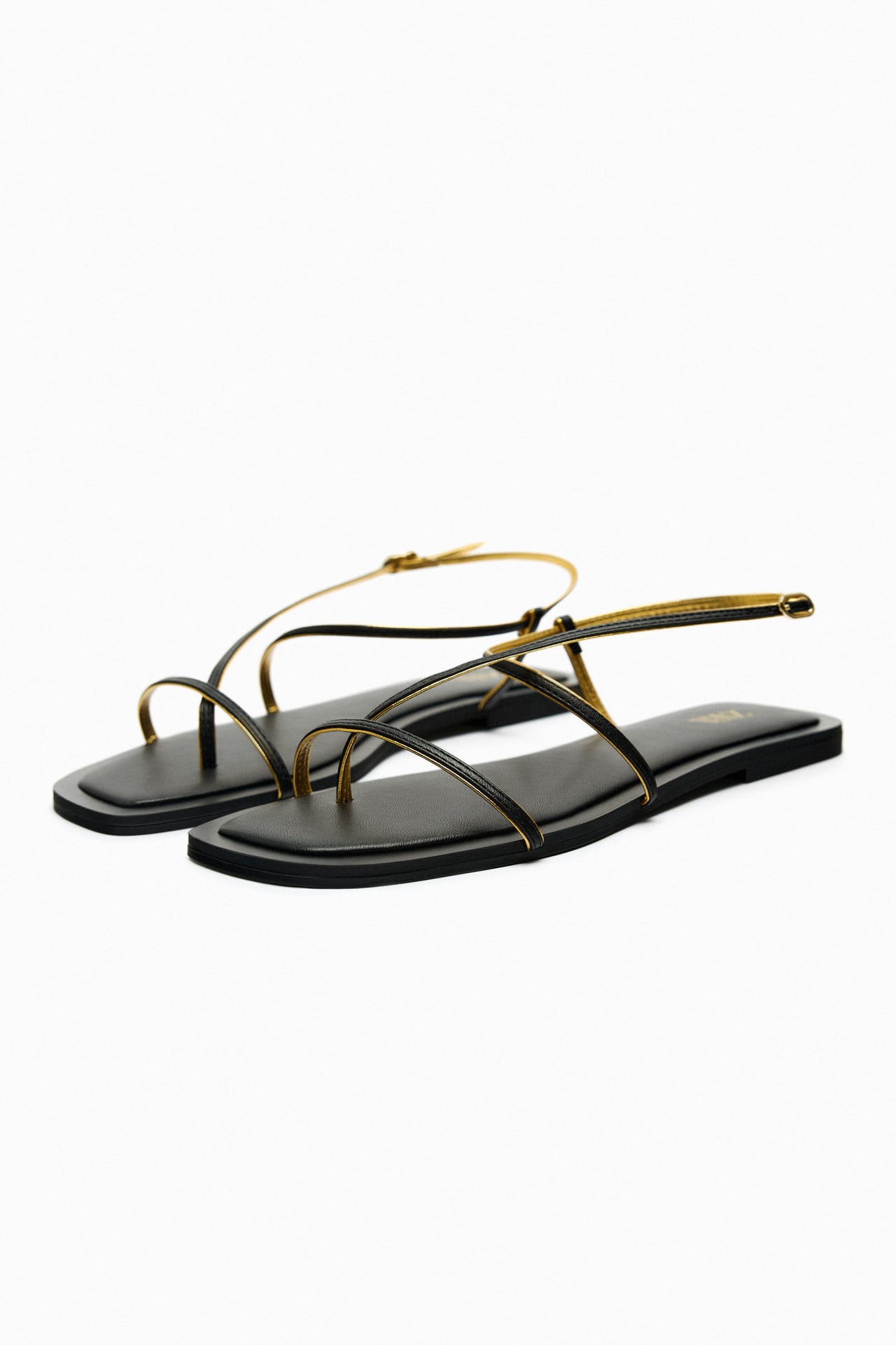 Black sandals with gold sales trim